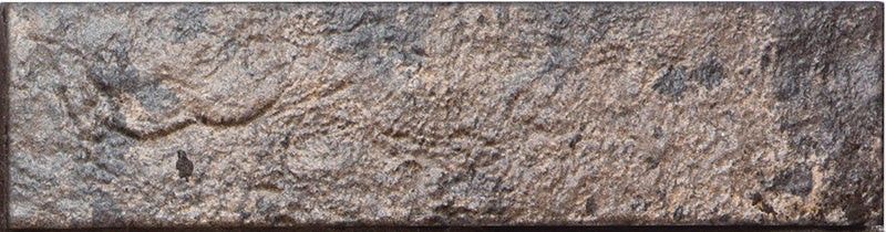 Un’inquadratura ravvicinata della piastrella Bristol Dark che evidenzia la superficie materica e il bordo naturale scalibrato. Il suo colore profondo e intenso crea un look audace e sofisticato, perfetto per spazi dal carattere urbano.