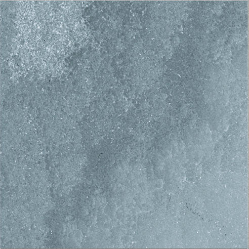 Dettaglio piastrella per pavimento e rivestimento in gres porcellanato effetto pietra spaziale. Collezione Swimming Pool di Ceramica Valsecchia, formato 15x15, Deep Emerald