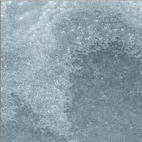 Dettaglio piastrella per pavimento e rivestimento in gres porcellanato effetto pietra spaziale. Collezione Swimming Pool di Ceramica Valsecchia, formato 15x15, Deep Emerald