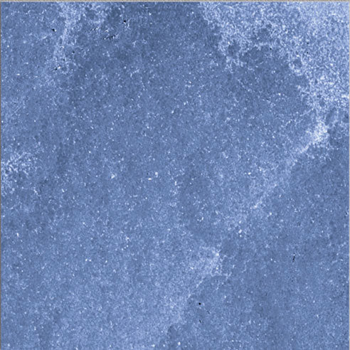 Dettaglio piastrella per pavimento e rivestimento in gres porcellanato effetto pietra spaziale. Collezione Swimming Pool di Ceramica Valsecchia, formato 15x15, Deep Ocean