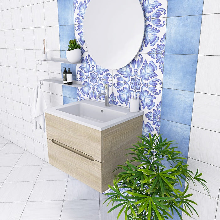 La composizione bagno Pandora 01 cattura l'attenzione con il suo minimale mobile sospeso, caratterizzato da linee pulite e un design essenziale che si integra perfettamente in ogni ambiente moderno. Il top con lavabo integrato in mineralmarmo, lucido e pratico, si abbina splendidamente alla finitura opaca del mobile, garantendo luminosità e facilità di pulizia.