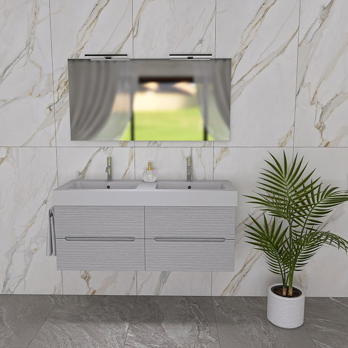La composizione bagno Pandora 05 è composta da un mobile sospeso della lunghezza di 120cm, un top con due lavabi integrati in ceramica lucida, uno specchio rettangolare a filo lucido lungo 120 cm con lampada superiore. 