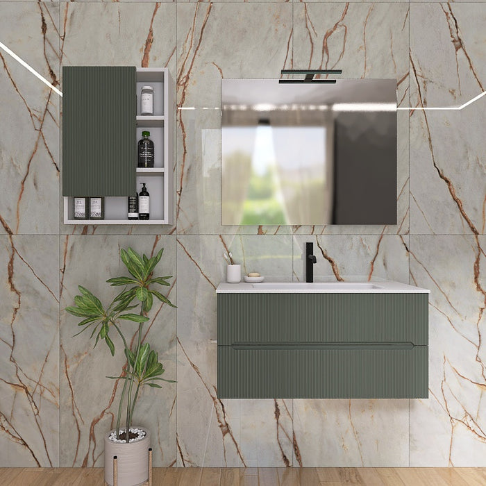 I mobili da bagno della serie Atena presentano una finitura cannettata. Il top con lavabo integrato in mineralmarmo bianco opaco crea un contrasto elegante e pulito. A completare l'insieme, uno specchio rettangolare a filo lucido con una moderna lampada a Led e il pensile, con ante in finitura e vani a giorno
Disponibile nelle finiture: Tortora Opaco, Bianco Opaco, Noce, Rovere e Verde bosco.
