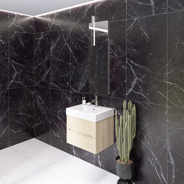 La composizione comprende una base sospesa di piccole dimensioni. La consolle con lavabo integrato in mineralmarmo si abbina a tutte le finiture. Specchio rettangolare slanciato con lampada superiore a Led bifacciale. Disponibile nelle finiture: Tortora Opaco, Bianco opaco, Verde opaco, rovere e noce.