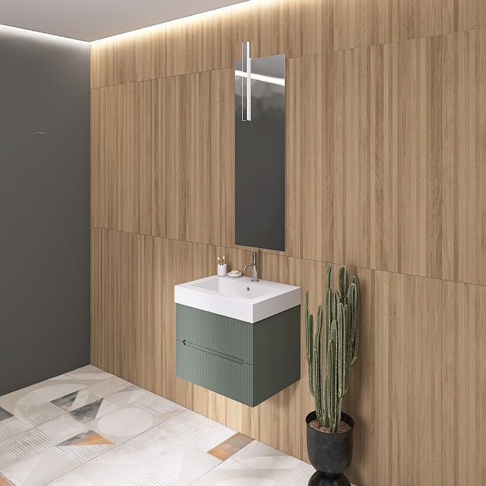 La composizione comprende una base sospesa di piccole dimensioni. La consolle con lavabo integrato in mineralmarmo si abbina a tutte le finiture. Specchio rettangolare slanciato con lampada superiore a Led bifacciale. Disponibile nelle finiture: Tortora Opaco, Bianco opaco, Verde opaco, rovere e noce.