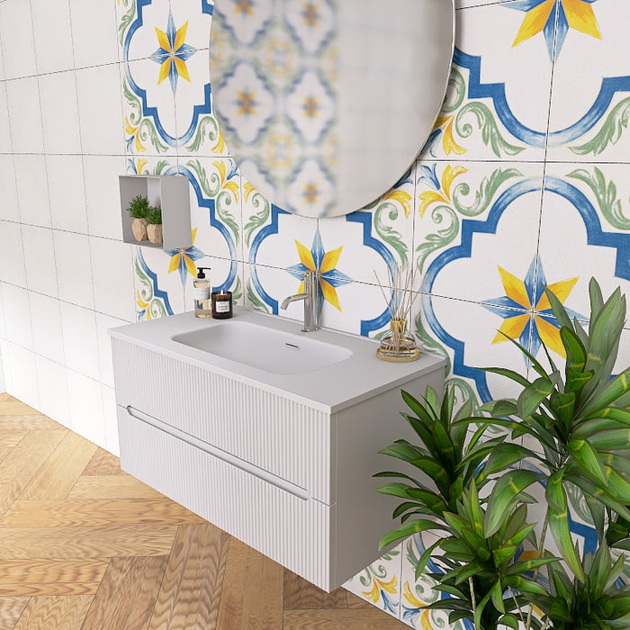 La composizione comprende una base sospesa di piccole dimensioni. La consolle con lavabo integrato in mineralmarmo si abbina a tutte le finiture. Specchio circolare slanciato . Disponibile nelle finiture: Tortora Opaco, Bianco opaco, Verde opaco, rovere e noce.