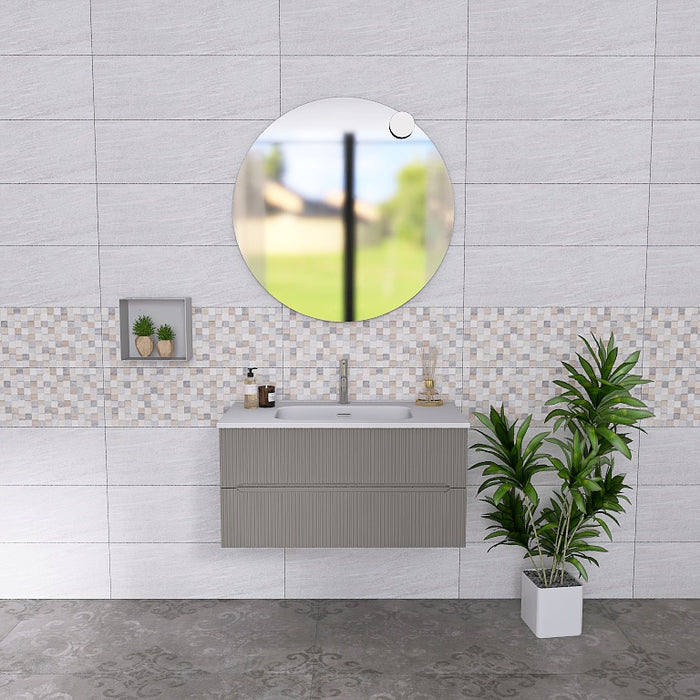 La composizione comprende una base sospesa di piccole dimensioni. La consolle con lavabo integrato in mineralmarmo si abbina a tutte le finiture. Specchio circolare slanciato . Disponibile nelle finiture: Tortora Opaco, Bianco opaco, Verde opaco, rovere e noce.