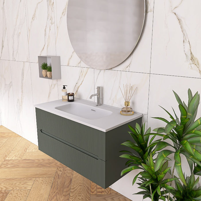 La composizione comprende una base sospesa di piccole dimensioni. La consolle con lavabo integrato in mineralmarmo si abbina a tutte le finiture. Specchio circolare slanciato . Disponibile nelle finiture: Tortora Opaco, Bianco opaco, Verde opaco, rovere e noce.