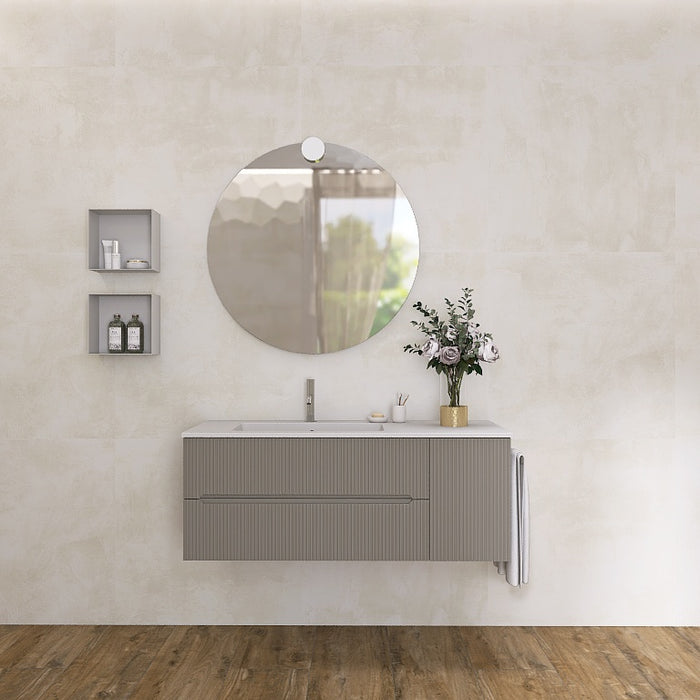La composizione comprende una base sospesa di medie dimensioni. La consolle con lavabo integrato in mineralmarmo si abbina a tutte le finiture. Specchio circolare . Disponibile nelle finiture: Tortora Opaco, Bianco opaco, Verde opaco, rovere e noce.