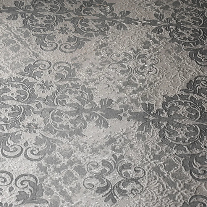 Dettaglio piastrella da rivestimento in gres porcellanato effetto damascato 60x120 della collezione Evoque, colore Lacche Grigio, di Ceramica Settecento