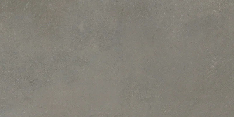 Dettaglio piastrella da pavimento in gres porcellanato effetto cemento 30x60 cm, della collezione Evoque, colore Cemento, di Ceramica Settecento