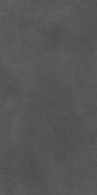 Dettaglio piastrella da pavimento in gres porcellanato effetto cemento 60x120 cm, della collezione Evoque, colore Coal, di Ceramica Settecento