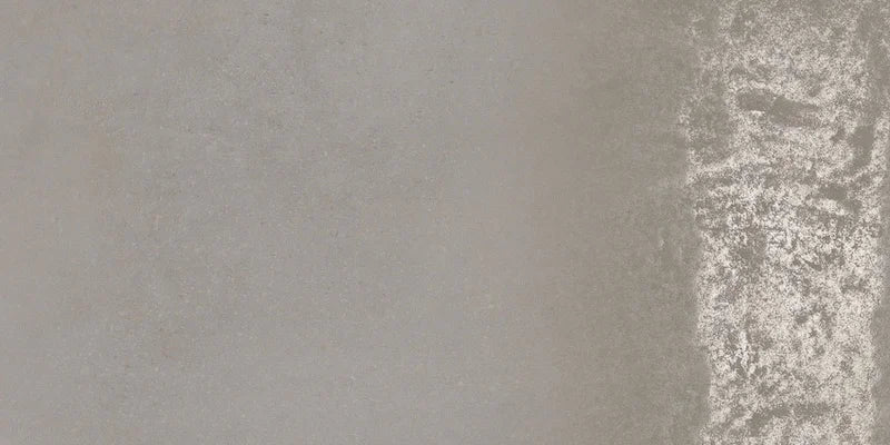 Dettaglio piastrella da pavimento in gres porcellanato effetto cemento lappato 30x60 cm, della collezione Evoque, colore Cemento, di Ceramica Settecento