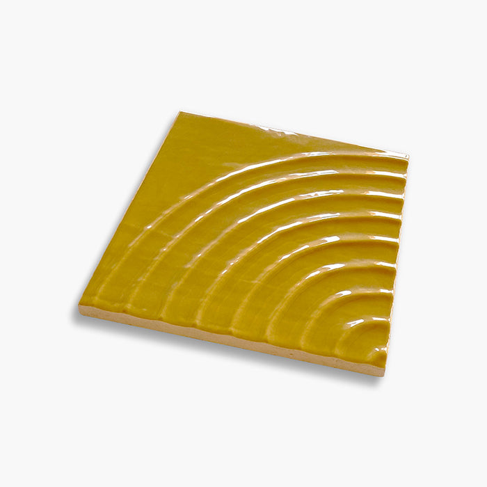 Foto del rivestimento Mustard Reel Glossy della collezione Flow di Keradom.