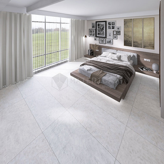 Camera da letto moderna con pavimento dal design sofisticato ed elegante in gres porcellanato effetto marmo opaco, ideale per ambienti moderni e raffinati. Collezione La Marmoteca di Gardenia Orchidea, formato 60x120 cm, colore Frozen