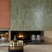 Dettaglio rivestimento in gres porcellanato serie Miniature Fuoco di Marca Corona, effetto mattoncino e metallo ossidato, formato 6x24 cm, Colore Verde Rame
