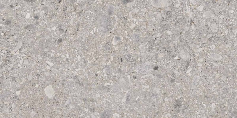 dettaglio piastrella in gres porcellanato effetto pietra naturale della collezione la geoteca nella colorazione ceppo di gre di gardenia orchidea 60x120