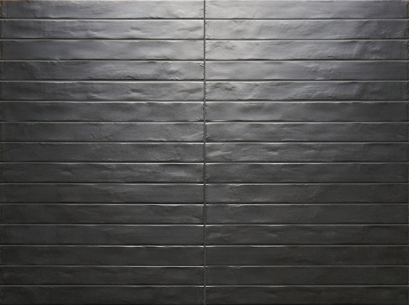Dettaglio posato piastrella per pavimento e rivestimento in gres porcellanato effetto mattoncino opaco 4.8x45 cm della collezione Graffiti, colore Charcoal di Ceramica Rondine