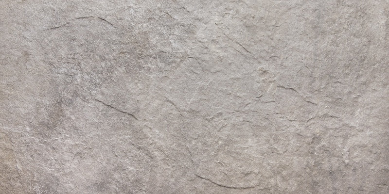 Dettaglio piastrella per pavimento e rivestimento in gres porcellanato effetto pietra ardesia. Collezione Ardesie di Ceramica Rondine, formato 30x60, Grey