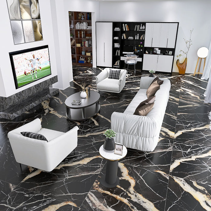 soggiorno moderno con pavimento dal design sofisticato ed elegante in gres porcellanato effetto marmo opaco, ideale per ambienti moderni e raffinati. Collezione La Marmoteca di Gardenia Orchidea, formato 120x120 cm, colore Golden Carbon