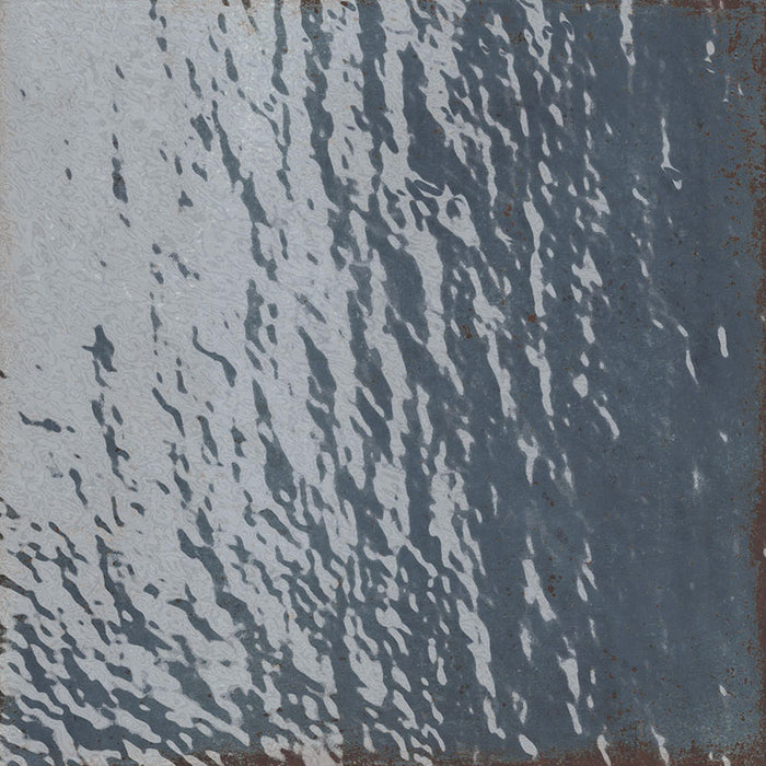 Dettaglio piastrella in gres porcellanato lucido stile vintage dal design Industrial chic della collezione Grunge di Savoia Italia, formato 21.6x21.6, colore Blu