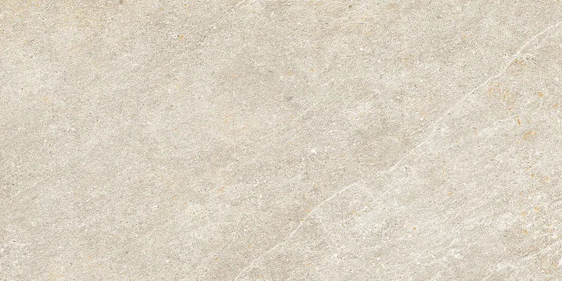 Piastrella Dolomia Ivory di Herberia Ceramiche in gres porcellanato effetto pietra 30x60 cm per pavimenti e rivestimenti contemporanei.