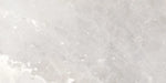Piastrella in gres porcellanato effetto marmo naturale della collezione Himalaya di Ceramica Rondine, formato 30x60 cm, colore Light Grey
