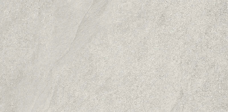 Piastrella ArkiStone Perla di Idea Ceramica in gres porcellanato effetto pietra 22x44 cm per pavimenti e rivestimenti contemporanei