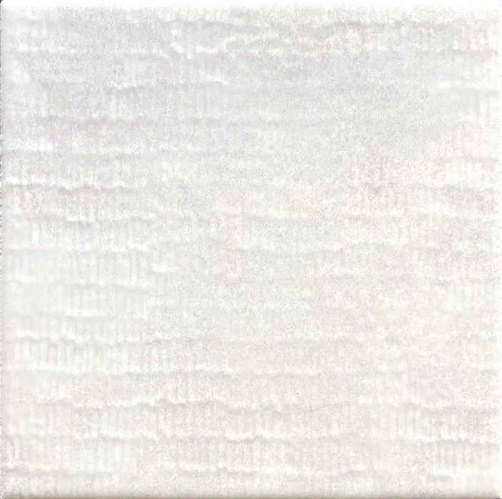 Dettaglio  piastrella per rivestimento in gres porcellanato effetto Scalpellato lucido Square 16,5x16,5 cm della collezione Inciso, colore Gypsum di Ceramica Settecento