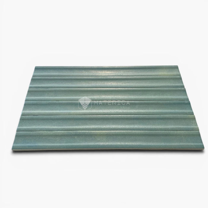 Foto piastrelle per rivestimento interno in gres porcellanato effetto mattoncino della collezione Iridescent di Ceramica Rondine, formato 4.8x45 cm, colore 3D Hump Sea Water