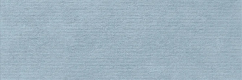 Piastrella per rivestimento bagno in bicottura pasta bianca rigata a rilievo della collezione Pictura di Idea Ceramica, formato 33x100 cm, colore Trame Petrolio
