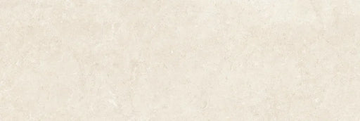 Piastrella per rivestimenti in bicottura pasta bianca effetto pietra della collezione Indira di Idea Ceramica, formato 33x100 cm, colore Cream