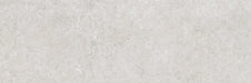 Piastrella per rivestimenti in bicottura pasta bianca effetto pietra della collezione Indira di Idea Ceramica, formato 33x100 cm, colore Grey