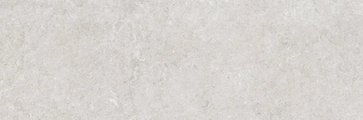 Piastrella per rivestimenti in bicottura pasta bianca effetto pietra della collezione Indira di Idea Ceramica, formato 33x100 cm, colore Grey