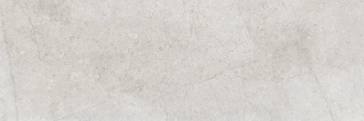 Piastrella per rivestimenti in bicottura pasta bianca effetto pietra della collezione Indira di Idea Ceramica, formato 33x100 cm, colore Grey