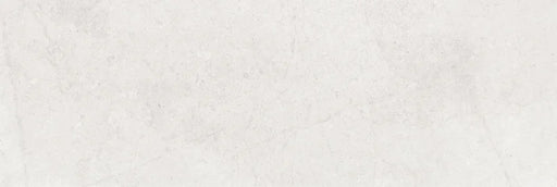 Piastrella per rivestimenti in bicottura pasta bianca effetto pietra della collezione Indira di Idea Ceramica, formato 33x100 cm, colore Ice