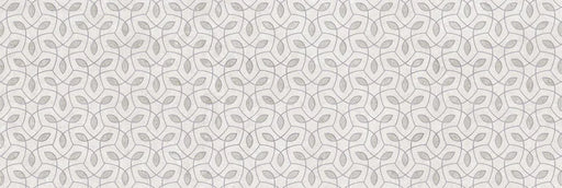 Piastrella per rivestimenti in bicottura pasta bianca con decoro geometrico della collezione Indira di Idea Ceramica, formato 33x100 cm, colore Ice
