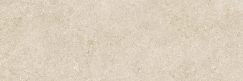 Piastrella per rivestimenti in bicottura pasta bianca effetto pietra della collezione Indira di Idea Ceramica, formato 33x100 cm, colore Sand
