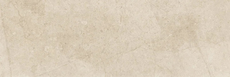 Piastrella per rivestimenti in bicottura pasta bianca effetto pietra della collezione Indira di Idea Ceramica, formato 33x100 cm, colore Sand