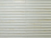 Piastrella per rivestimento interno in gres porcellanato effetto mattoncino a rilievo della collezione Iridescent di Ceramica Rondine, formato 4.8x45 cm, colore 3D Hump Ivory