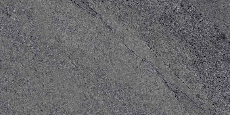 dettaglio piastrella per pavimento e rivestimento effetto pietra ardesia. collezione Ubik, formato 30x60, colore Anthracite