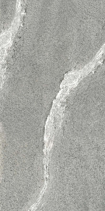 Dettaglio piastrella in gres porcellanato effetto pietra. Percorsi Frame di ceramiche keope 60x120 colore Gneiss Grey