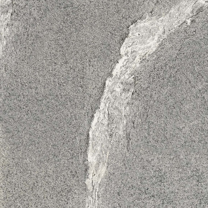 Dettaglio piastrella in gres porcellanato effetto pietra. Percorsi Frame di ceramiche keope 60x60 colore Gneiss Grey