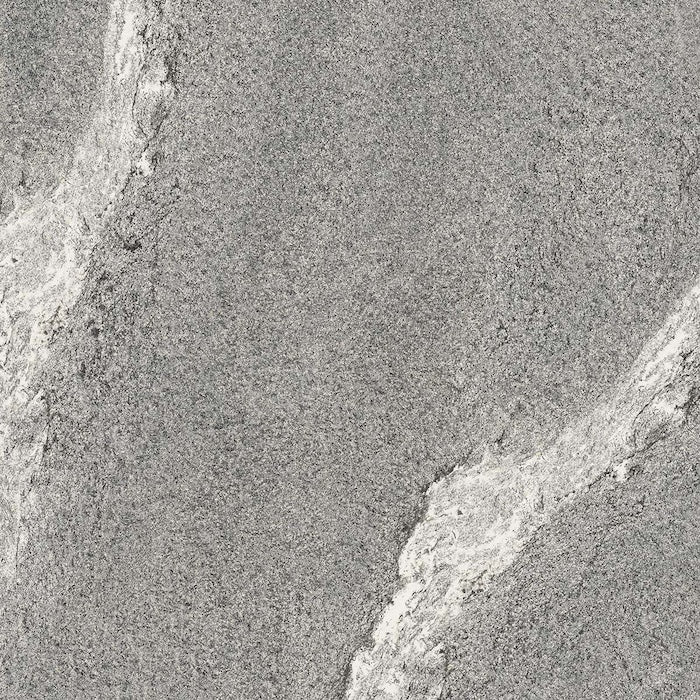 Dettaglio piastrella in gres porcellanato effetto pietra. Percorsi Frame di ceramiche keope 60x60 colore Gneiss Grey