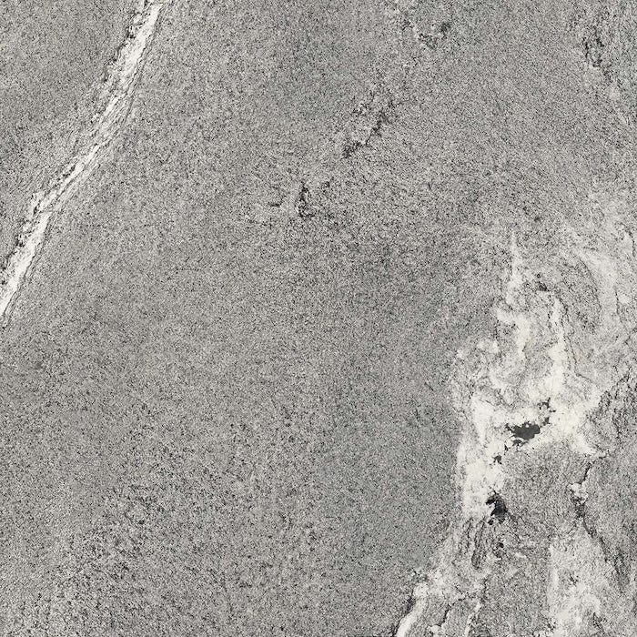 Dettaglio piastrella in gres porcellanato effetto pietra. Percorsi Frame di ceramiche keope 60x60 colore Gneiss Grey