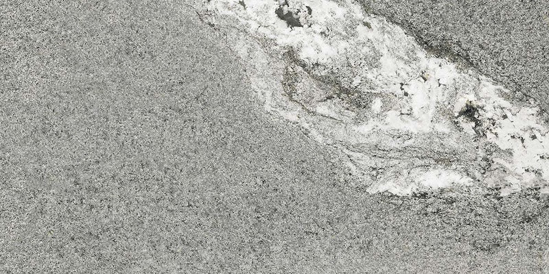 Dettaglio piastrella in gres porcellanato effetto pietra. Percorsi Frame di ceramiche keope 30x60 colore Gneiss Grey