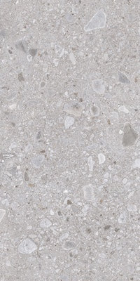 Dettaglio piastrella in gres porcellanato effetto pietra naturale europea. Omnia di ceramiche keope 60x120 colore Ceppo Grey