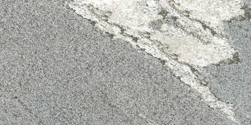 Dettaglio piastrella in gres porcellanato effetto pietra per esterni. Percorsi Frame di ceramiche keope 30x60 antiscivolo colore Gneiss Grey
