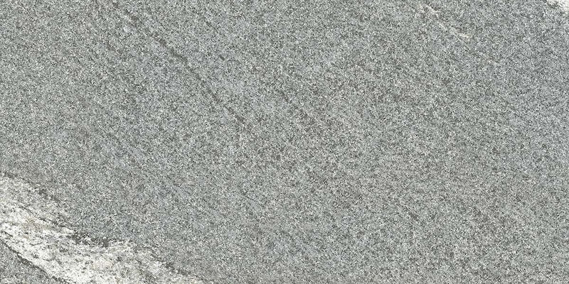 Dettaglio piastrella in gres porcellanato effetto pietra per esterni. Percorsi Frame di ceramiche keope 30x60 antiscivolo colore Gneiss Grey