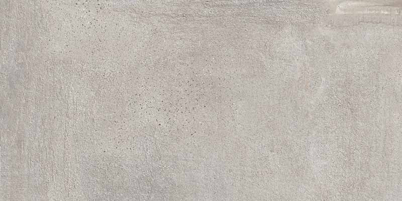 Dettaglio piastrella in gres porcellanato effetto cemento. Street di ceramiche keope 22x45 colore Milano Silver